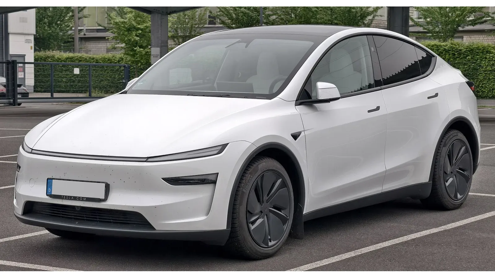 Tesla Model Y front three-quarter view — SeaTac CONRAC rental model gallery